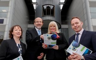 Prof Lisa Looney (Executive Dean, Faculty of Engineering & Computing), Prof Brian MacCraith (President, DCU), Mary Mitchell O'Connor T.D. (Minister of State for Higher Education), Mr Paul Healy (Chief Executive, Skillnet Ireland) outside the Stokes Building, DCU